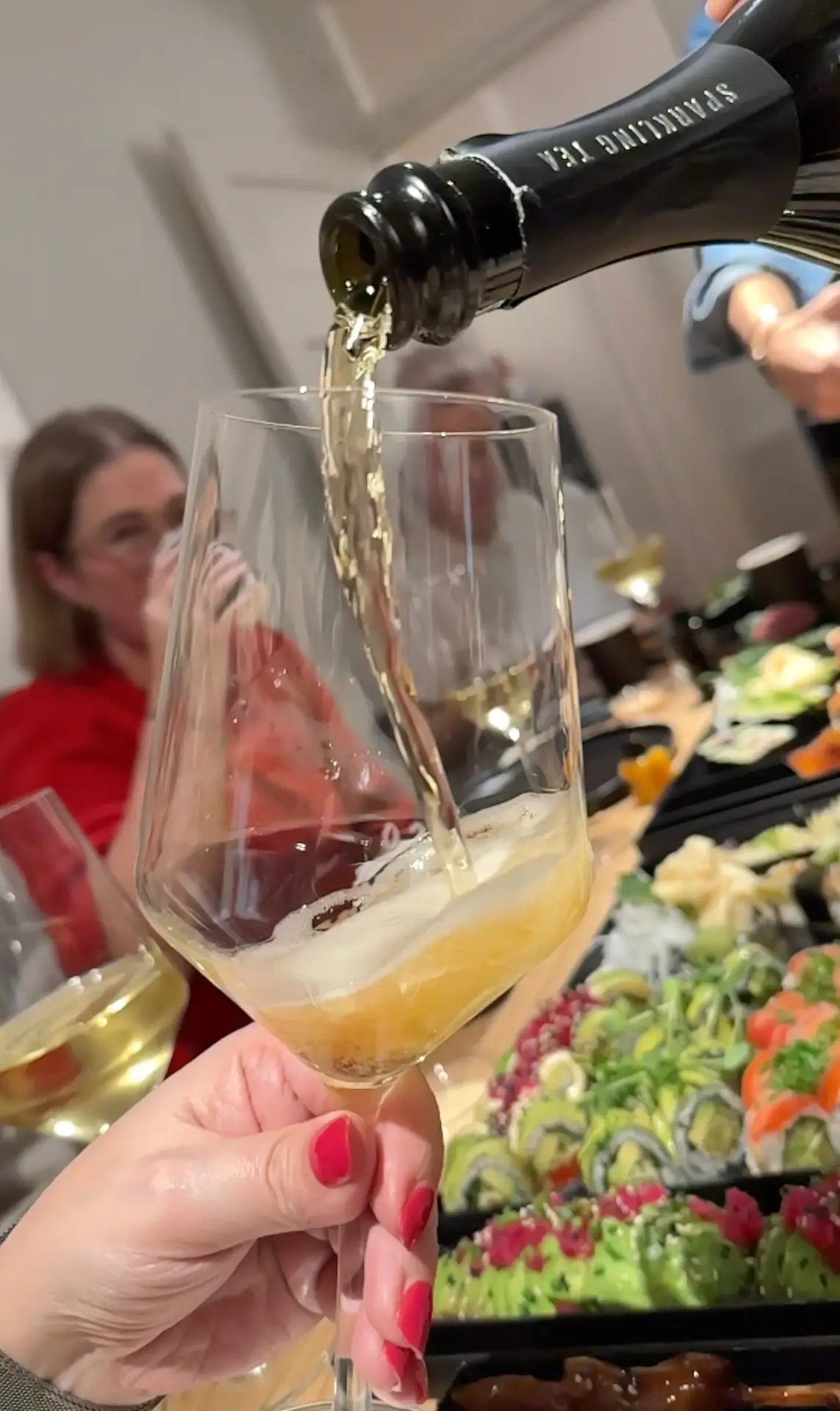 champagne is being poured